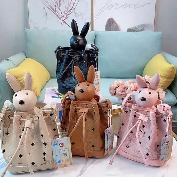 

classic leather rabbit bucket bag with shoulder rivets in fashion