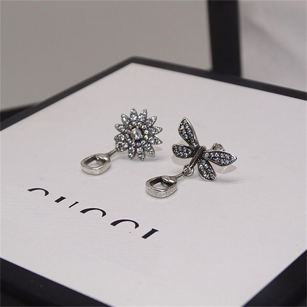 

jewelry zhigujia daisy inlaid with asymmetric and stone earrings trend 70% off outlet store sale, Golden