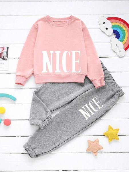 

little girl's lettered pullover and panties she, White