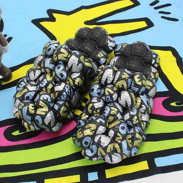 Slipper New Designer Women Camouflag Graffiti Bubble Slides con Charms Bagno esterno Uomo Pantofole da massaggio Sandali da spiaggia 0729