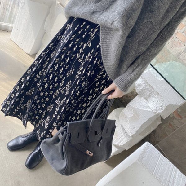

designer high waist pleated knitted skirt women's elastic loose thin broken flower a-line pit strip long 2022, White