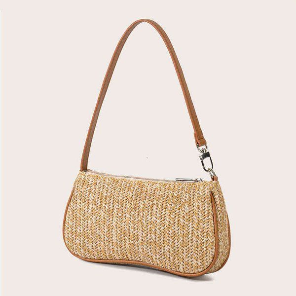 

grass woven bag with armpit staff in summer