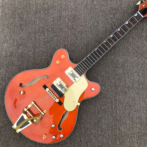 

jazz hollow body electric guitar, double f holes, dual output, gold hardware, tremolo system as same of the pictures