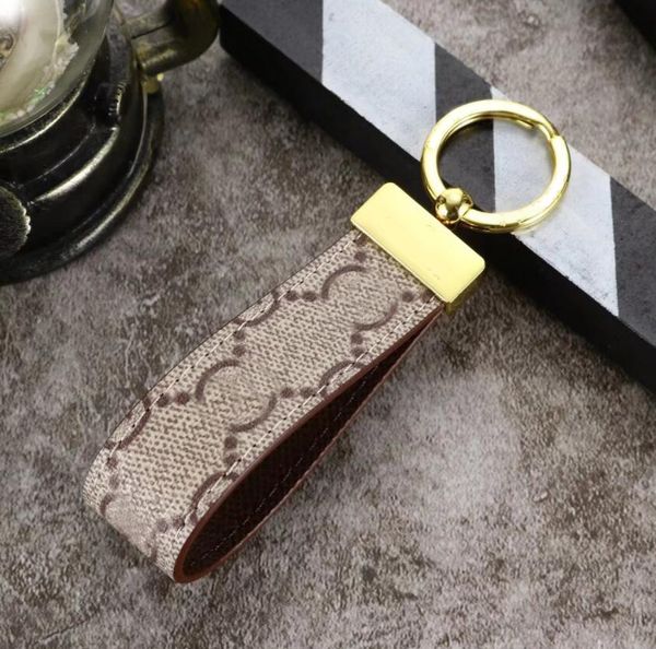 

designer brand keychain key chain men luxury car keyring women fashion bee buckle keychains handmade leather men women bags pendant accessor, Silver