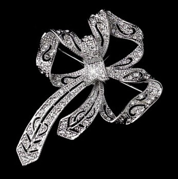 

2.5" rhodium silver tone clear cz rhinestone curly ribbon brooch, Gray