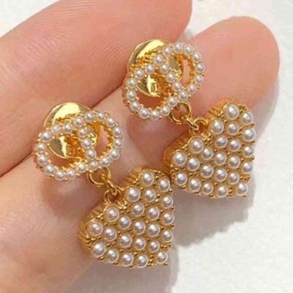 

lovely pearl earring womens simple heart-shaped personalized earrings, Golden