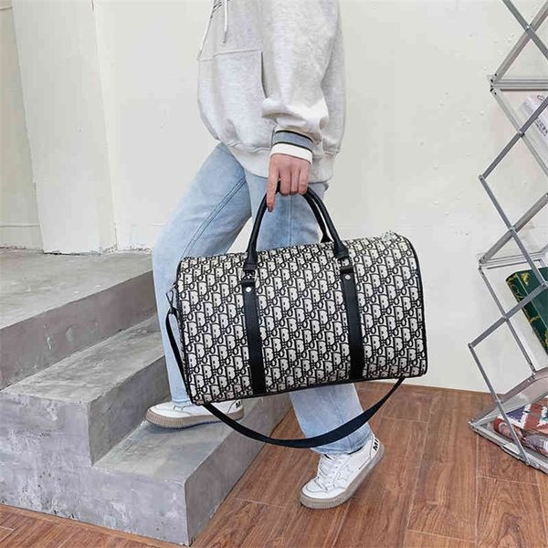 

75% off outlet store new korean women's hand-held diagonal luggage short distance large capacity travel bag
