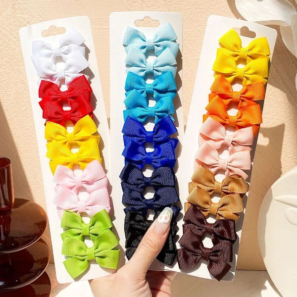 10pcs/set Clipes de cabelo de cabelos de mini -arcos sólidos para meninas butiques de fita de fita Bowknot de cabeceira de cabeleireiro