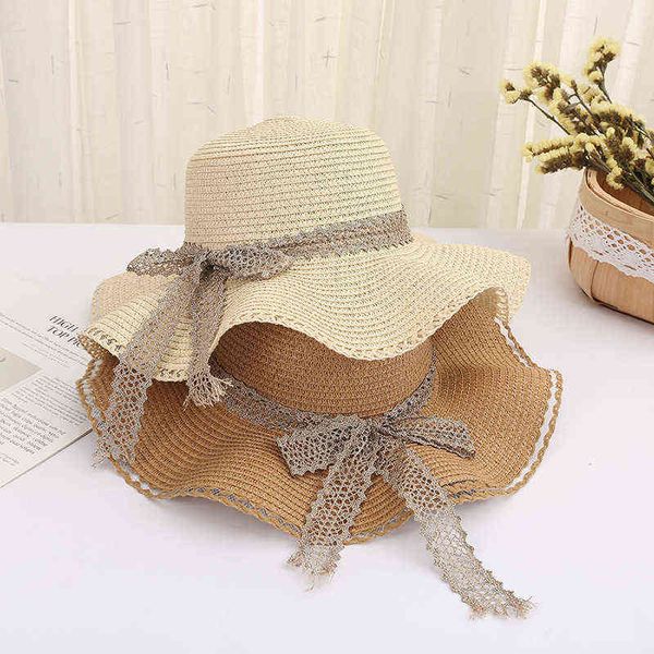 Summer Beach Cappello di paglia da donna a tesa larga pieghevole cappello da spiaggia con fiocco 2022 New Female Summer Vacation Panama Girl Sun Hat all'ingrosso G220301