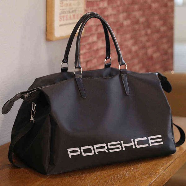 Bolsas de mochila online Bolsa de viagem portátil popular grande capacidade à prova d'água masculina e feminina armazenamento de bagagem saco de fitness leve 220707