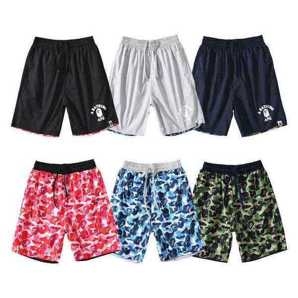 

ape trendy head shark double face camouflage shorts, White;black