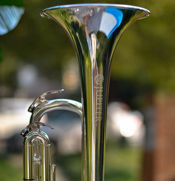 

trumpet instrument brass silver plated surface trumpet with case accessories