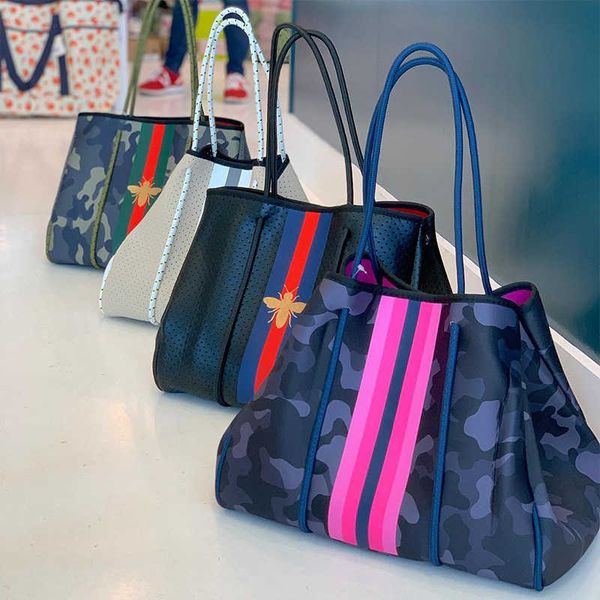 

outdoor diving material perforated beach bag fashion large capacity hand shopping waterproof portable beach bag
