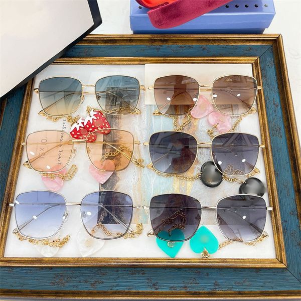 

50% discount for factory direct salesg family's new strawberry love pendant chain box sunglasses net red same sunglasses gg1030, White;black