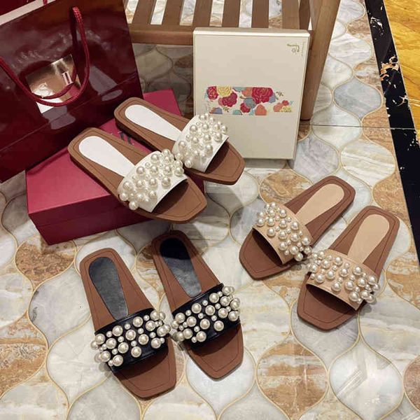 

sandals in spring and summer of the trend flat bottomed one-line with pearl color matching sandals for women's low heel leisure wearing, Black