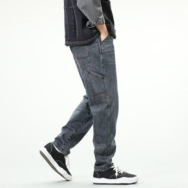 Jeans masculinos Moda de rua de rua solteira Multi bolsos casuais calças de jeans de jeans casual calças de macacão de hip hop
