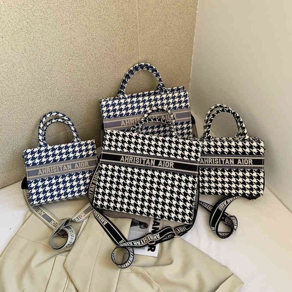 

2022 new designer handbags high version portable letter high capacity tote fashion one shoulder messenger