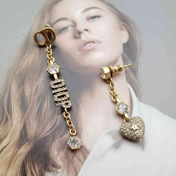 

2022 factory wholesale new old love, full of tassels, small fragrance, asymmetric fashionable and simple earrings, female mevf, Golden