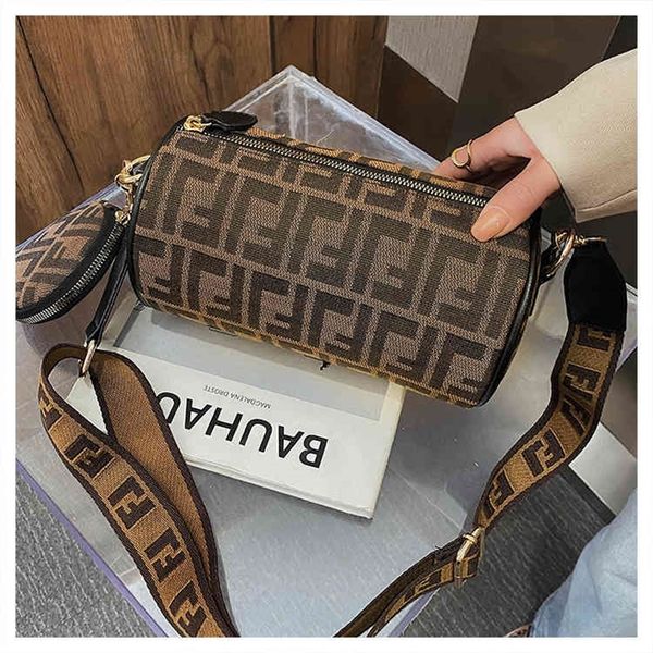 

60% off trendy bags 2022 new designer handbags autumn and winter new style messenger wide belt simple cylinder pillow old flower women'