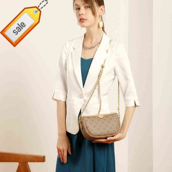 

tb designer fashion trendy handbag bucket shoulder factory online export 2022 women's new old flower bag canvas leather diagonal
