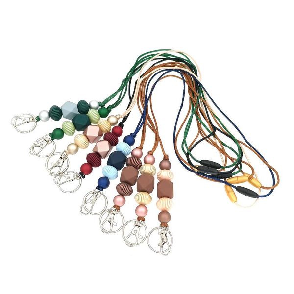 Colares pendentes Colar de cordão de manobra de moda Kurshuni para escritório de mulheres contas de borracha de idéias com o Key Ring Professor 2022 Trend
