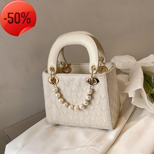 

the factory directly women's handbag with small fragrance temperament