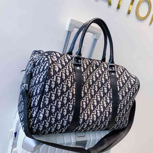 

factory direct sale 2022 new boarding female luggage oxford cloth short distance portable travel designer bag