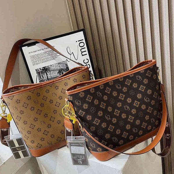 

2022 factory wholesale new net red women's fashion commuter portable one shoulder shopping bag texture large capacity child mother tote