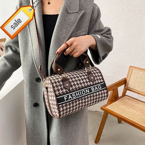 

2022 trendy fashion design ladies bags factory direct clothing popular lattice women's new one shoulder texture portable