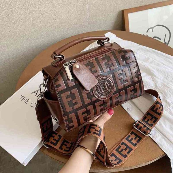 

2022 new designer handbags embossed letter wide strap messenger one