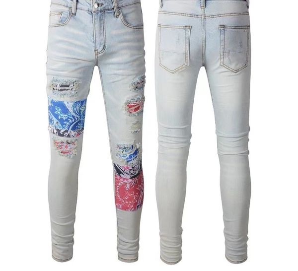Designer Uomo Jeans Hip-hop Moda Pantaloni con cerniera con foro Lavaggio Retro Cuciture piegate strappate Design da uomo Moto da equitazione Pantaloni slim cool Blu cielo