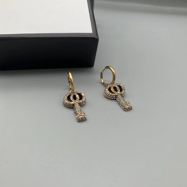 

2022 brand original jewelry designer dangle new zircon letter key pendant women's personality high-end earrings temperament all-match, Silver