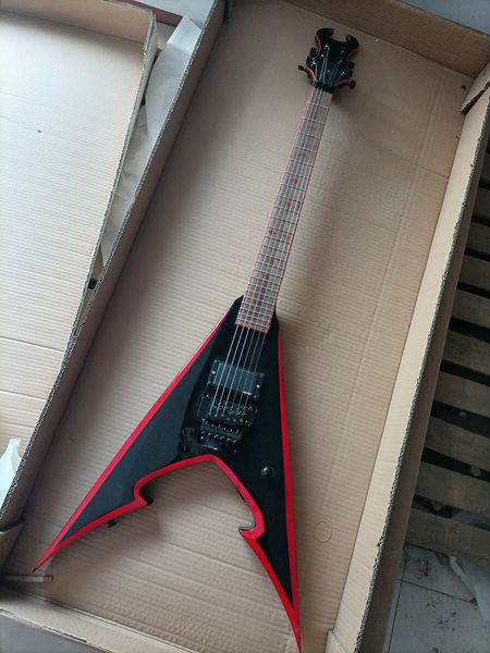 

unusual v shaped black electric guitar rosewood fretboard