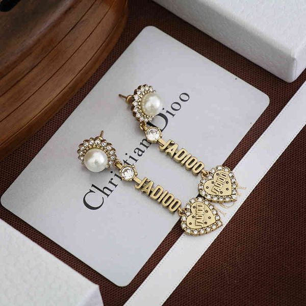 

2022 factory wholesale new love for women new red diamond heart earrings, Golden