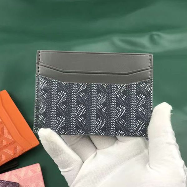 Porta del portafoglio di carta di design classico da uomo moneta da donna in pelle nera porta passaporto in pelle di lusso carte di credito a doppia faccia di lusso Mini portafoglio con scatola 10231