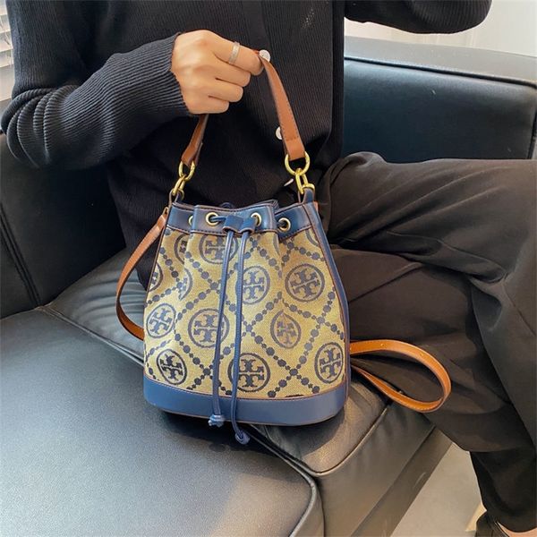 

10% off 2022 new trendy handbags bucket hollow out simple fairy new vintage canvas with women's drawstring single shoulder messenger ha