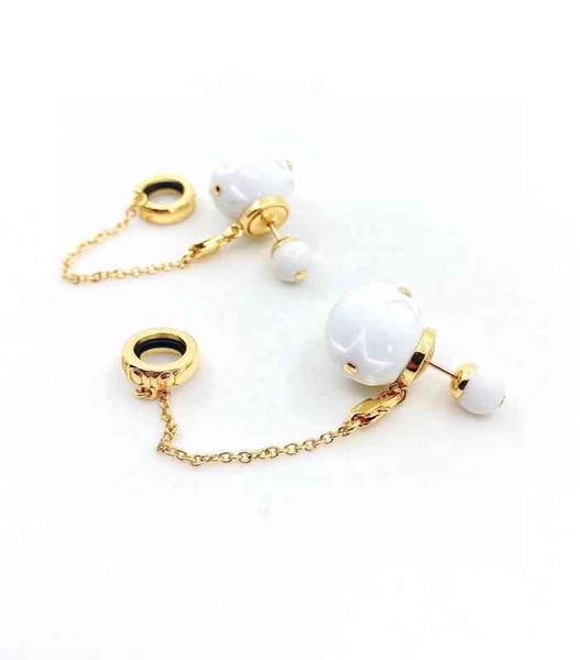 

2022 new baby the same porcelain fused to metal bluetooth headset anti drop ear clip fashion high-grade earrings, Golden