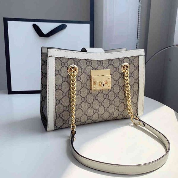 

handbags leather women's 2022 new spring high sense tote large capacity chain portable one shoulder armpit