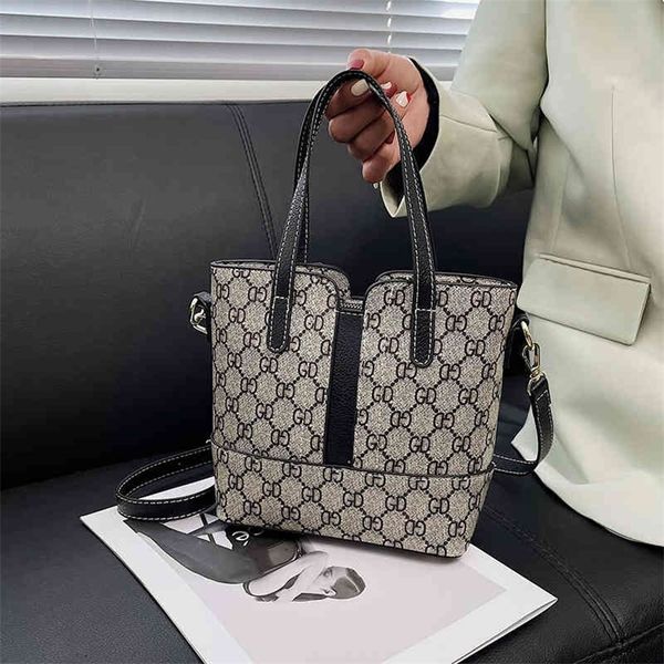 

75% handbags outlet sale early spring 2022 new korean personalized messenger tote bag fashion portable printed single shoulder bag versatile