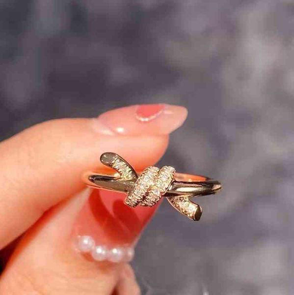 

lmtb t's new fashion knot series double line ring with cross knot and kink design and diamond inlaid couple's ring, Silver