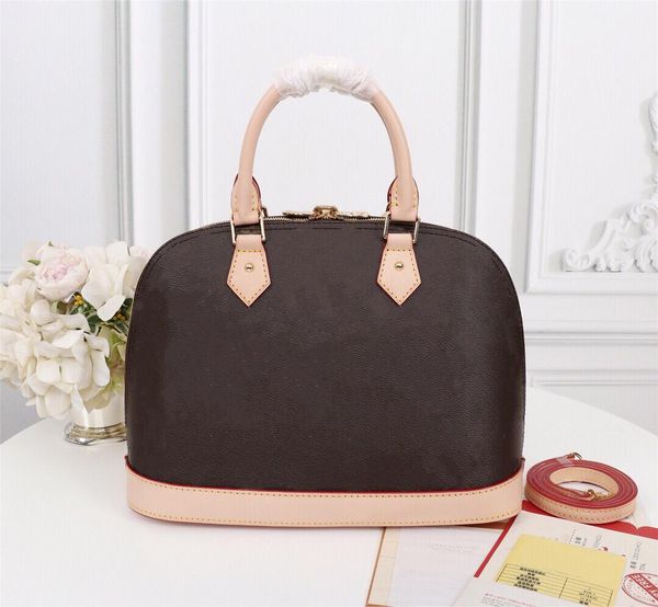 

alma bb handbag golden padlock keys 2 toron handles fitted with detachable strap charming small bag perfect for crossbody wear
