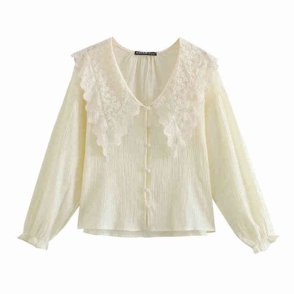 

xnwmnz women hollow embroidery turndown collar white shirts female long puff sleeve blouses casual lady loose button blusas 210513