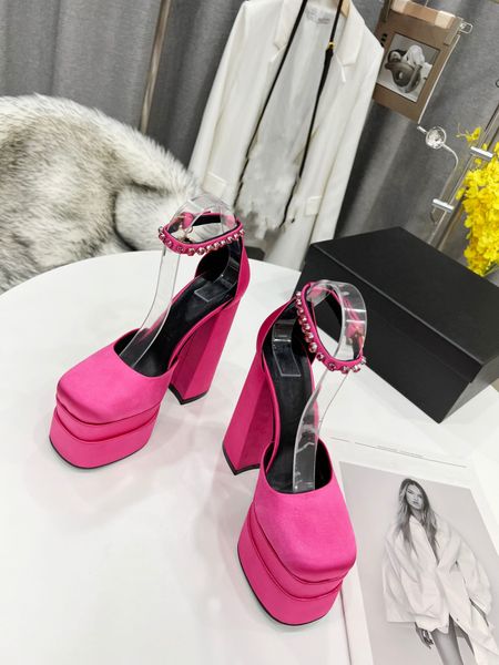 

the sandals are designed runway style, fitted with bold block heel and a double-decker platform. ankle straps are embellished rhinestones, Black