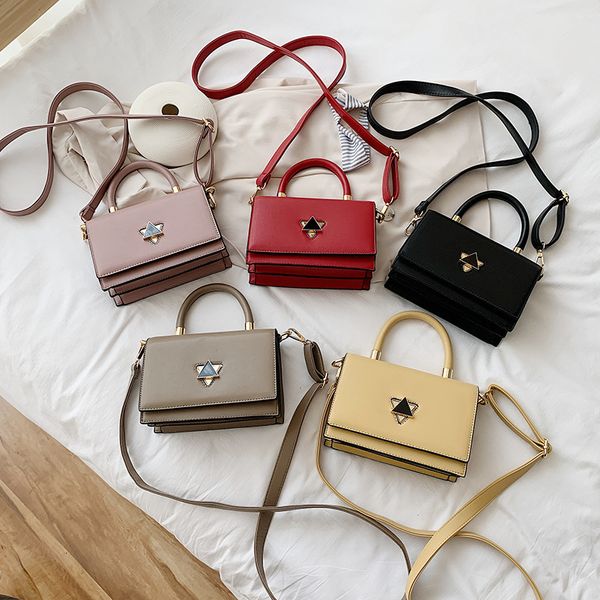 

designer bags 2022 new french minority texture triangle lock fashion portable women's korean messenger