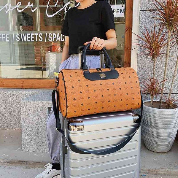 

duffel bags 2022 travel bag women's korean version large capacity portable waterproof and wear-resistant short distance