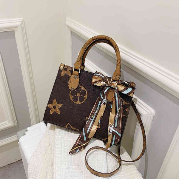 

factory outlet laohua bag female 2022 new single shoulder messenger handbag large capacity women's tote bag