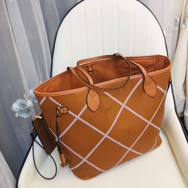 

2022 designer luxury designer tote never bag women wild at heart shopping full leather handbags shoulder balck white checkered empreinte bag