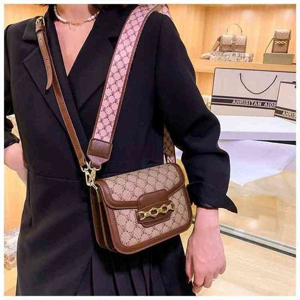 

70% factory online sale handbag red texture portable small bag female style wide lock square single shoulder bag bags