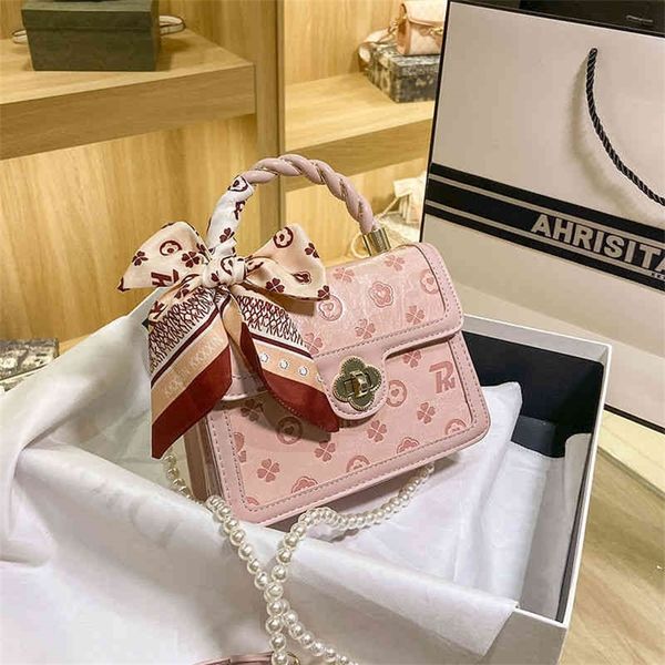 

super fire cool strange bear embossed female fashion silk scarf belt foreign style pearl single shoulder bag 75% purses stores sale