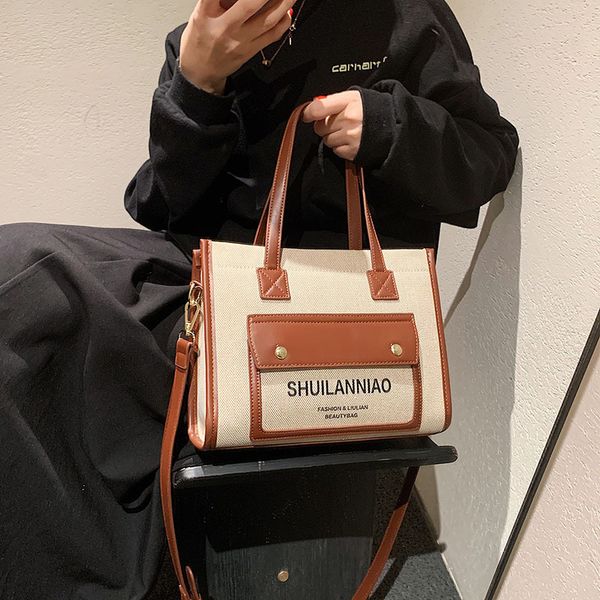 

designer bags 2022 spring and summer new women's bag fashion trend large capacity shopping letter canvas tote hand bill shoulder